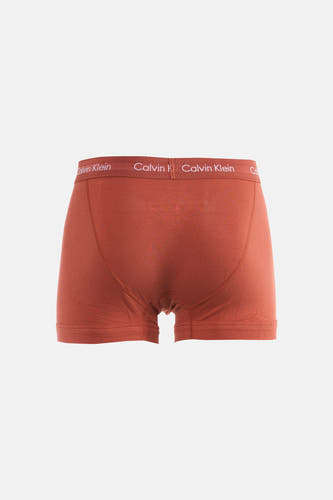 Bruinrode boxershort van Calvin Klein, met een witte logoband aan de bovenkant.