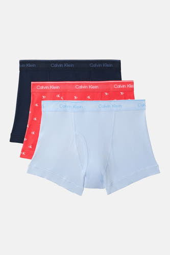 Meerkleurige boxershorts van Calvin Klein, met effen designs in blauw, rood en lichtblauw.

