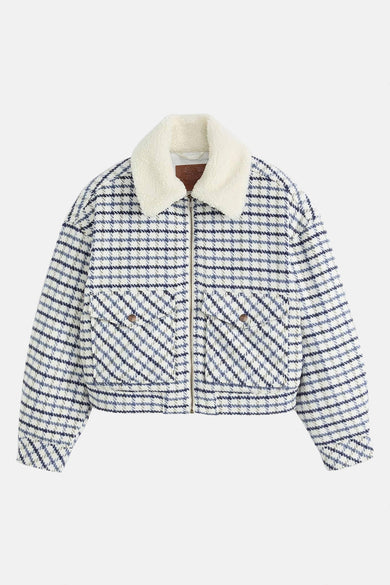 Veste multicolore de Levi's® avec une col teddy blanc, un motif à carreaux et des poches avec des boutons.