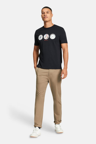 Zwart T-shirt van Ben Sherman, met ronde grafische prints en gedragen met kaki broek en witte sneakers.