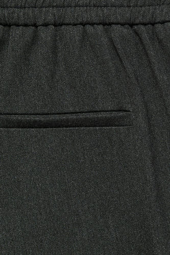Pantalon de costume gris VERO MODA, avec une ceinture élastique et un passant de ceinture sur l'arrière.