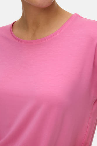 T-shirt rose à manches courtes de VERO MODA, avec un col rond et de couleur unie.