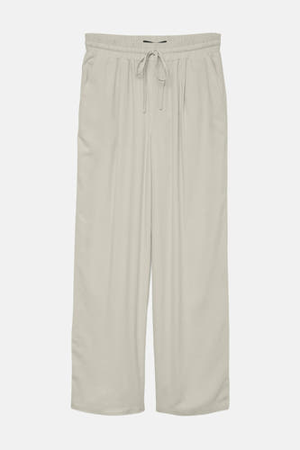 Beige broek van VERO MODA®, met trekkoord in de taille en wijde pijpen.
