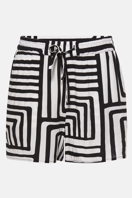 Short noir de Vero Moda avec un motif graphique noir et blanc frappant et une fermeture éclair.
