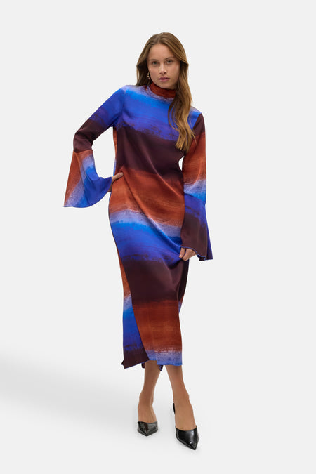 Multikleurige jurk met lange mouwen van VERO MODA, met een opvallend gestreept ontwerp en losse mouwen.
