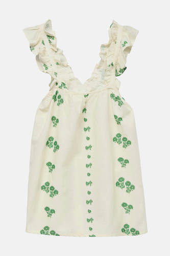 Ecru mouwloze blouse van VERO MODA, met groene bloemmotieven en ruches bij de schouders.
