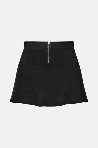 Zwarte korte rok van VERO MODA, met een zilverkleurige rits op de achterkant en een effen textuur.