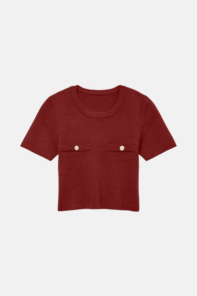 Sweat-shirt couleur bordeaux de VERO MODA, avec des manches courtes et deux boutons décoratifs dorés.