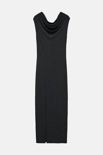 Jupe sans manches noire de Vero Moda, avec un col en cascade et un motif à points, avec une fente.