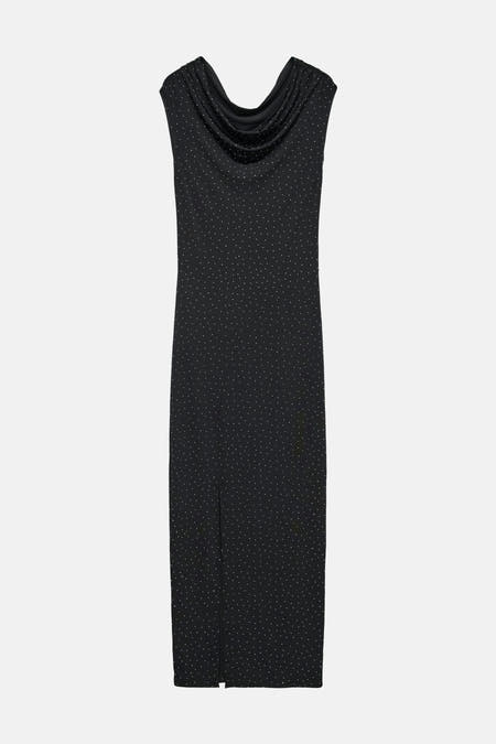 Jupe sans manches noire de Vero Moda, avec un col en cascade et un motif à points, avec une fente.