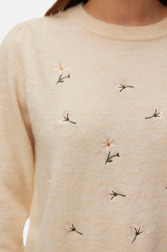 Pull écru à col rond de VERO MODA® avec détails de fleurs brodées et manches longues.