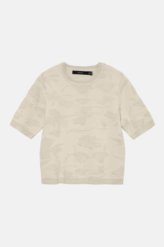 Ecru trui met ronde hals van VERO MODA, met een subtiel bloemdessin en korte mouwen.