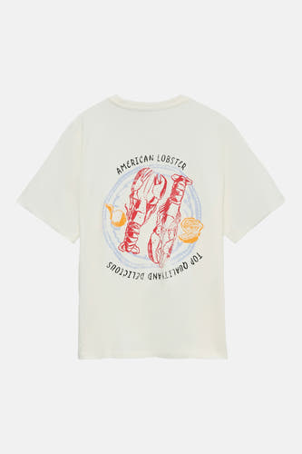 Wit T-shirt van VERO MODA® met een rode kreeftenprint en de tekst 'AMERICAN LOBSTER' op de rug.