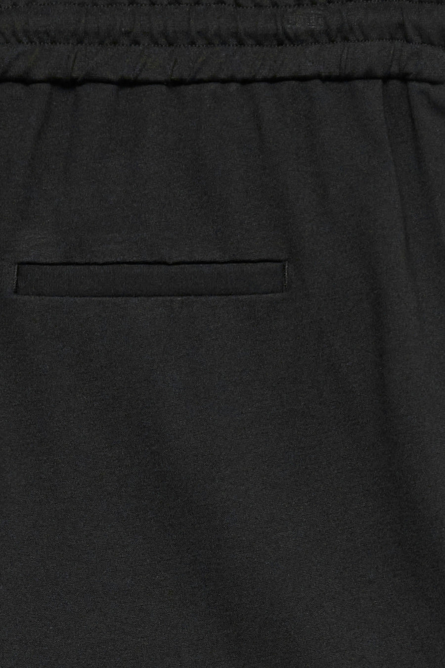 Pantalon noir de VERO MODA, avec taille élastique et une poche dissimulée sur le côté.