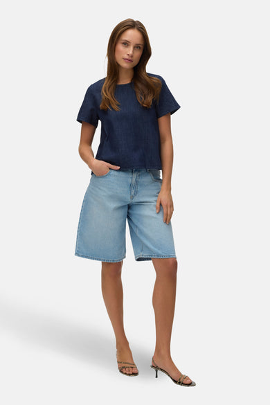 Blouse met korte mouwen van donkerblauw denim van VERO MODA®, met een effen kleur en korte mouwen.
