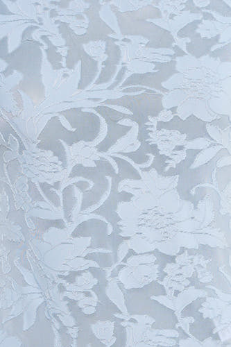 T-shirt bleu de VERO MODA® avec motif floral raffiné et texture subtile.