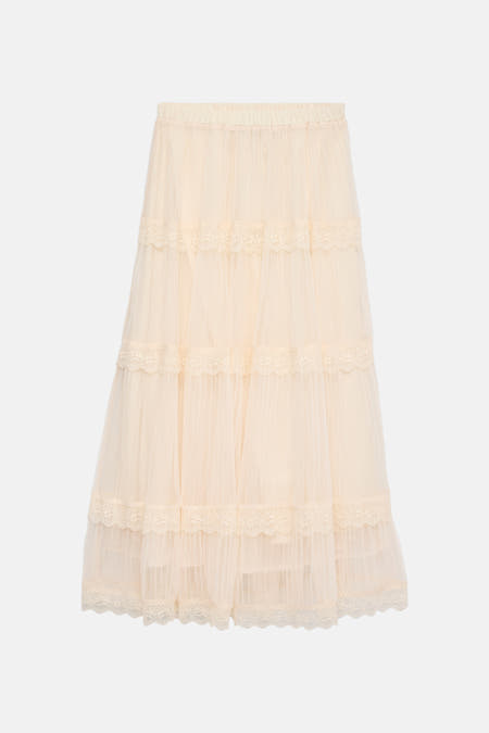 Lange ecru rok van VERO MODA®, met kanten details en een gelaagde tule rok.
