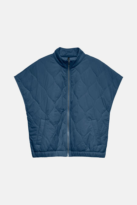 Blauwe bodywarmer van VERO MODA, met een ruitpatroon en ritssluiting.
