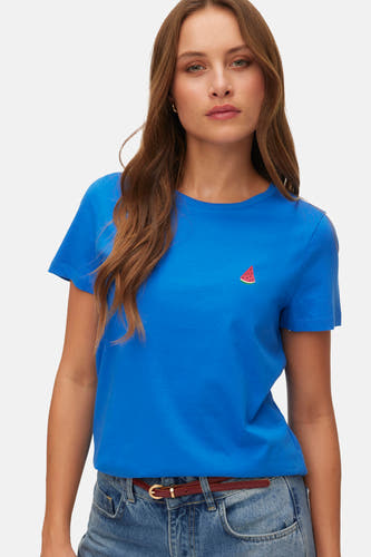 T-shirt bleu à manches courtes de VERO MODA, vu de dos, avec un jean.