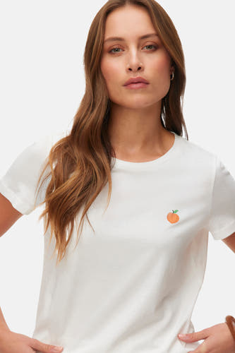 Wit T-shirt met korte mouwen van VERO MODA®, met een kleine perzik print op de borst.