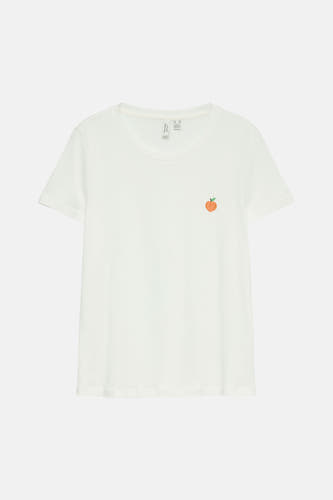 Wit T-shirt met korte mouwen van VERO MODA®, met een kleine perzik applicatie op de borst.