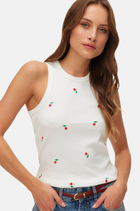 Witte singlet van VERO MODA®, met een ribstof en een all-over kersenborduursel.
