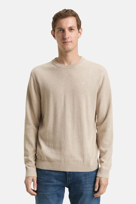 Gilet rond col en beige de TOM TAILOR, vu du dos, avec des manches longues et un bord côtelé, associé à des jeans.
