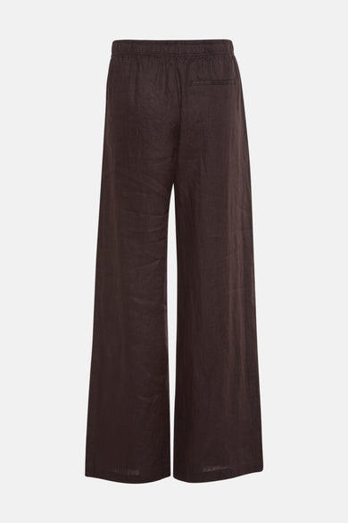 Pantalon brun d'OPUS, avec des jambes larges et une ceinture élastique, vu de l'arrière.