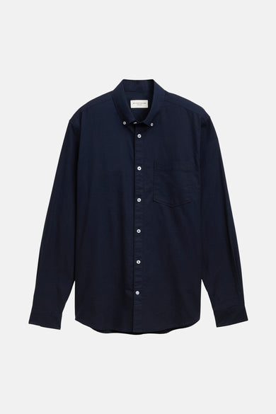 Donkerblauw, effen overhemd met lange mouwen van TOM TAILOR, met witte knopen en een borstzak.