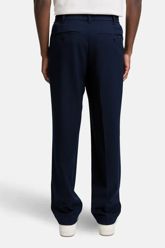 Pantalon bleu de TOM TAILOR, vu d'arrière, avec poches et passants.