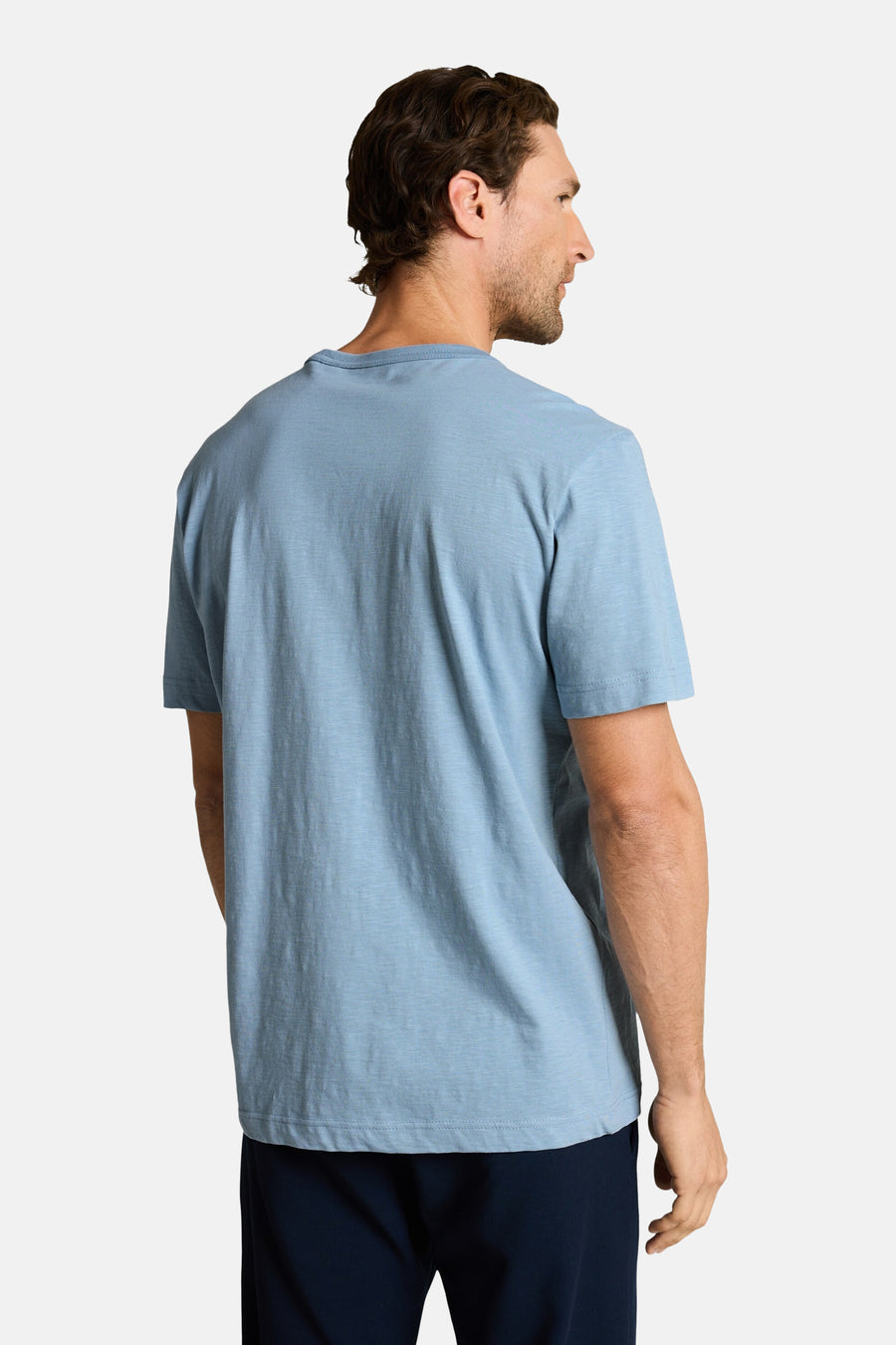Blauw T-shirt met korte mouwen van TOM TAILOR, rugaanzicht gedragen met donkere broek.