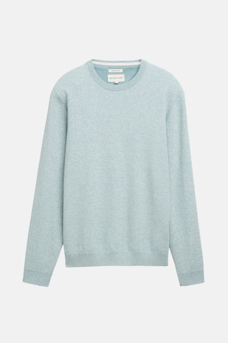 Lichtblauwe katoenen trui.