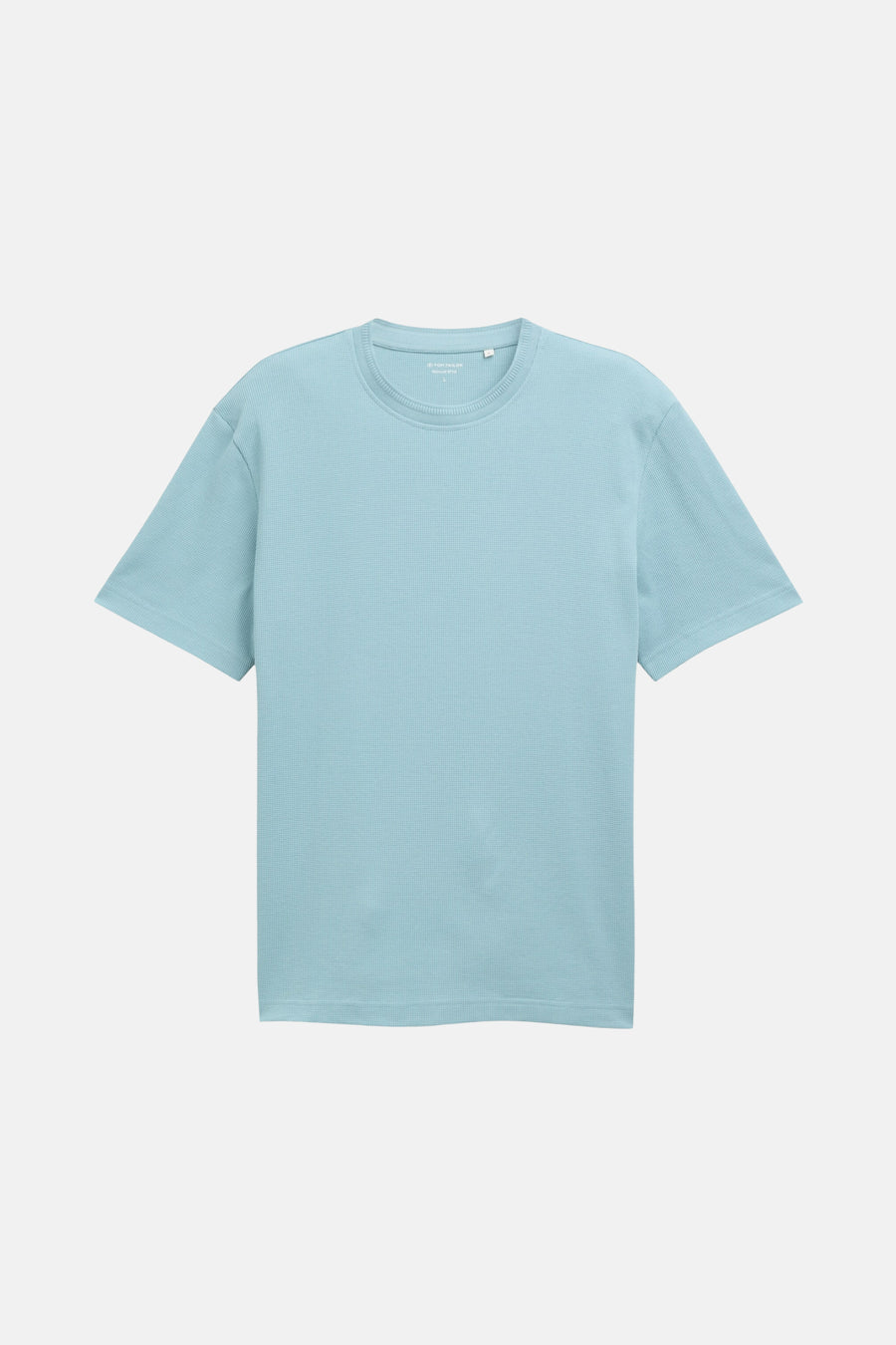 Lichtblauw T-shirt van wafelstof.
