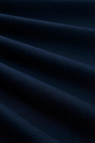 Pull-over bleu de TOM TAILOR, avec une texture douce et des plis subtils dans le tissu.