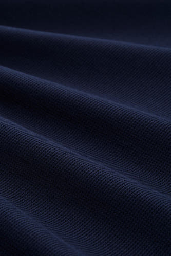 Blauw T-shirt met korte mouwen van TOM TAILOR, met een subtiele geweven textuur en plooien in de stof.
