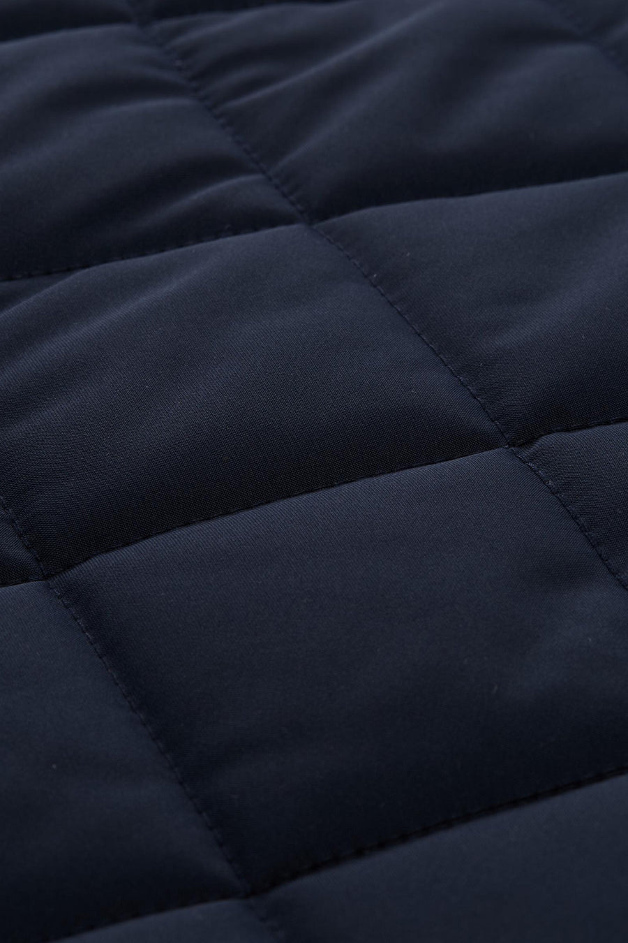 Blauwe korte jas van Tom Tailor met een gewatteerd ruitpatroon en subtiele stiksels.