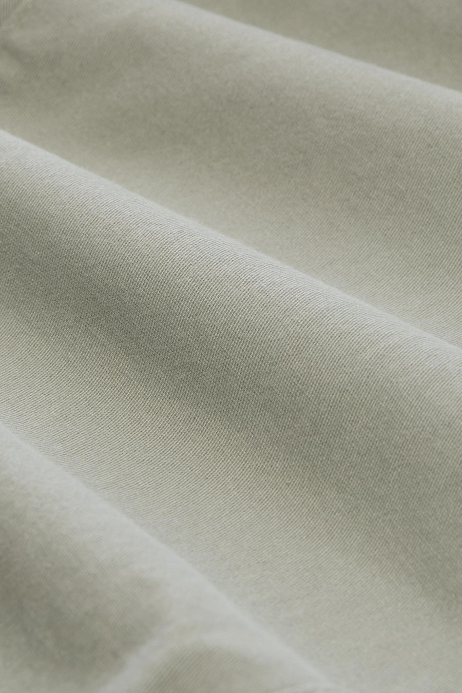 Shorts vertes de TOM TAILOR, vue détaillée du tissu avec de subtils plis et une texture diagonale.