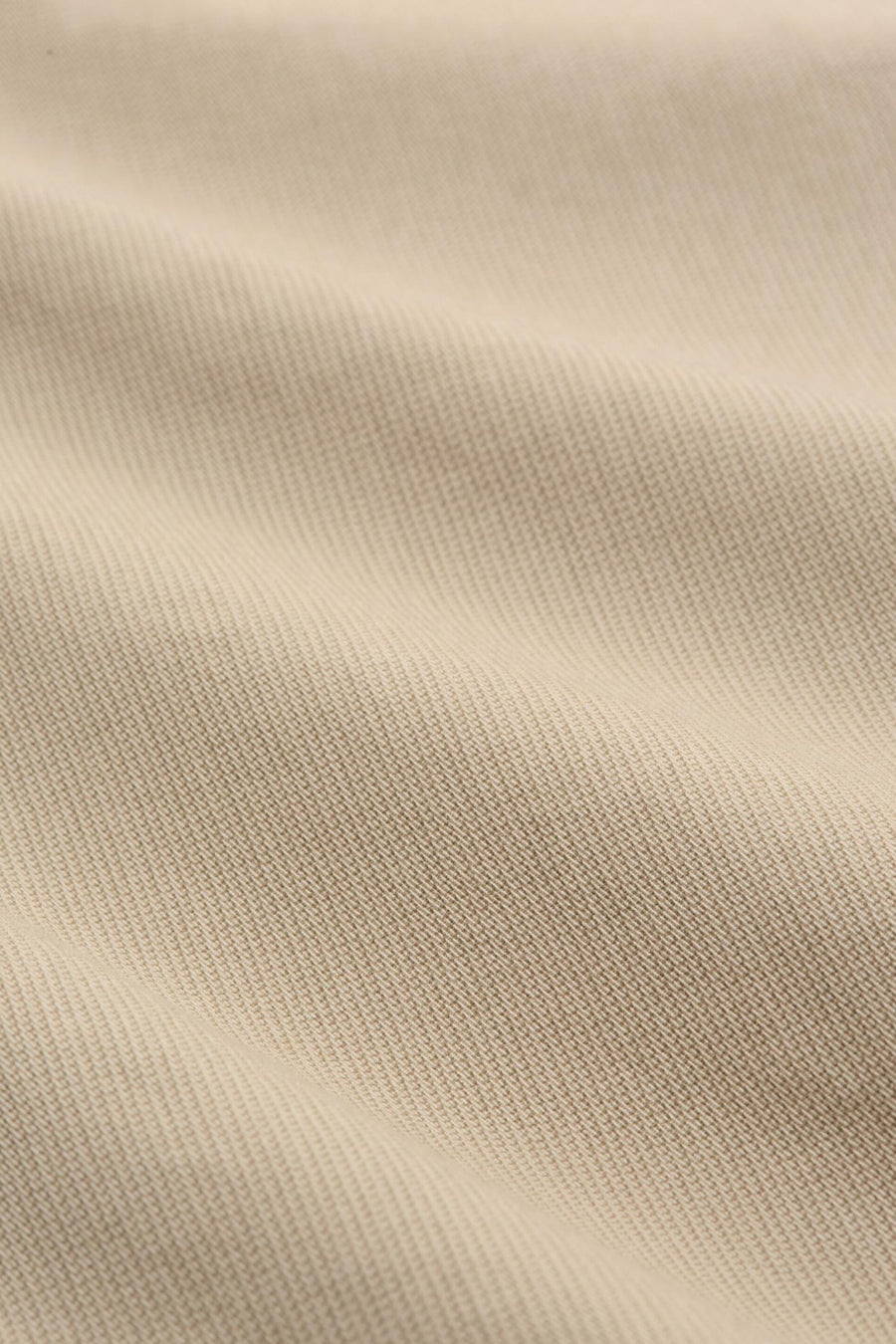 Beige bermuda van TOM TAILOR, met een subtiele textuur en zachte plooien.

