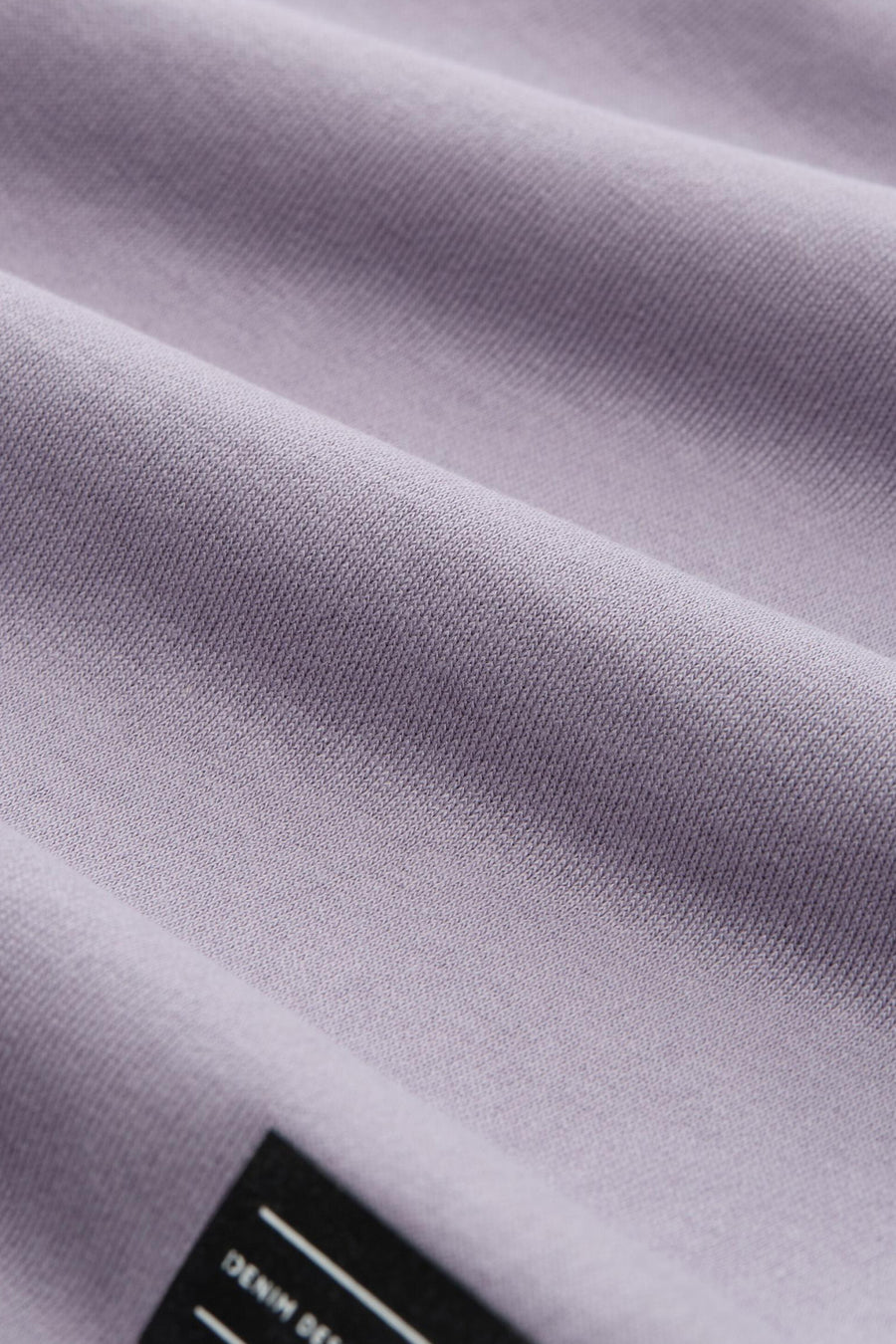 Short violet de TOM TAILOR, avec texture de tissu visible et une étiquette sur la jambe.