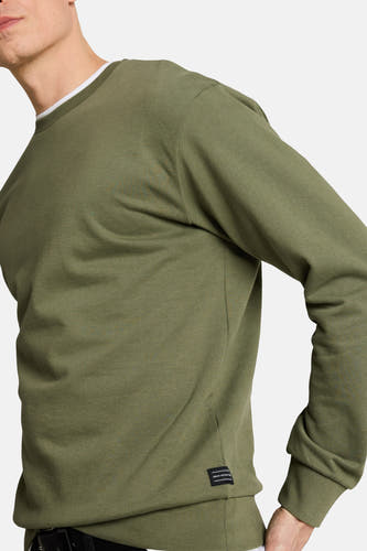 Groene ronde hals sweater van TOM TAILOR, zijaanzicht met ribstructuur en label aan de zoom