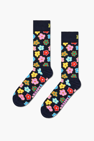 Multikleurige sokken van Happy Socks met een bloemenpatroon en het woord 'Happy' erop.