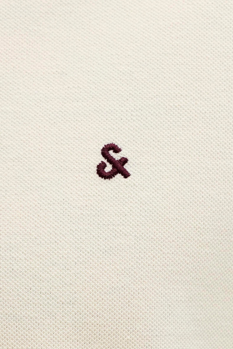 Polo écru de PREMIUM by JACK & JONES avec un esperluette brodé.