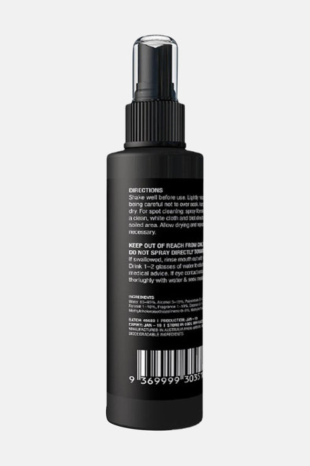 Flacon pulvérisateur noir avec bouchon côtelé de ACCESSORIES BY JACK & JONES, vue arrière avec texte blanc et code-barres, prise de vue frontale