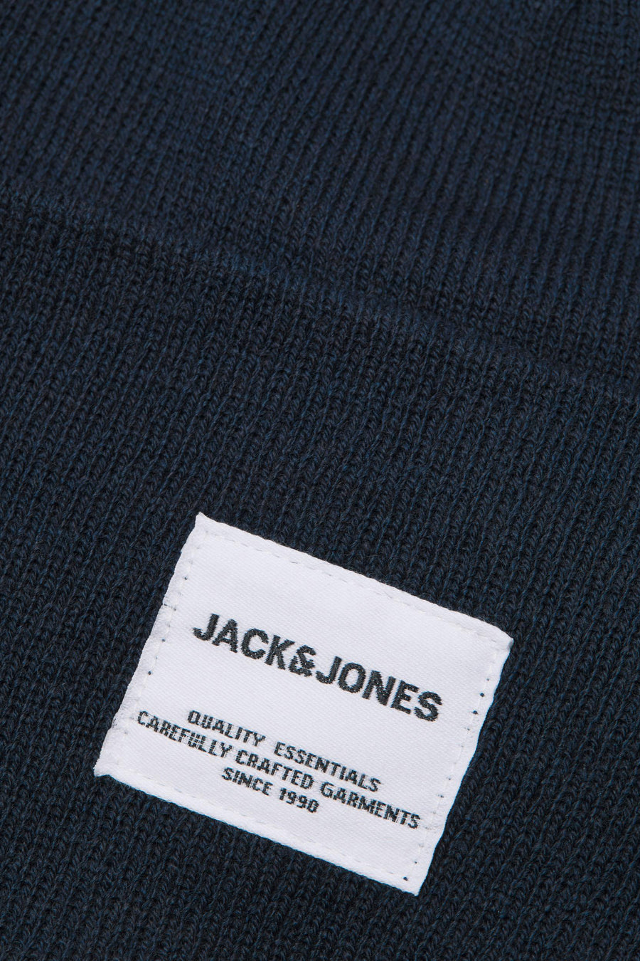 Casquette bleue d'ACCESSORIES BY JACK & JONES, avec une texture tricotée et un étiquette tissée.