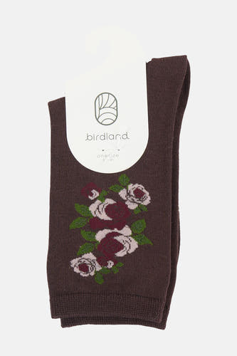 Donkerbruine sokken van BIRDLAND met een patroon van roze en bordeauxrode rozen en groene bladeren.