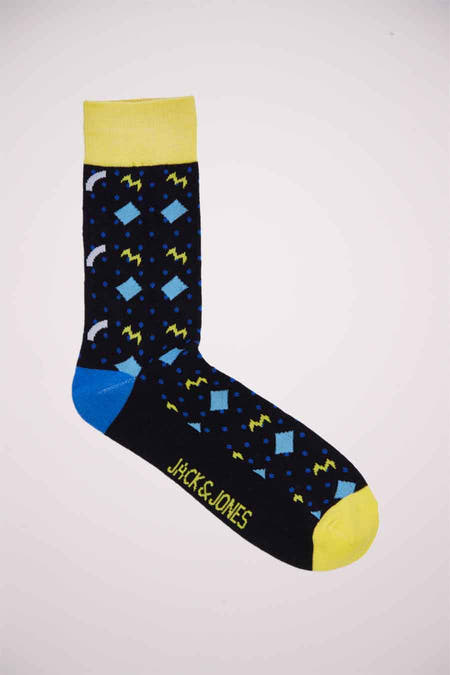 Zwarte sokken van ACCESSORIES BY JACK & JONES met een gele boord, blauwe hak en diverse patronen.
