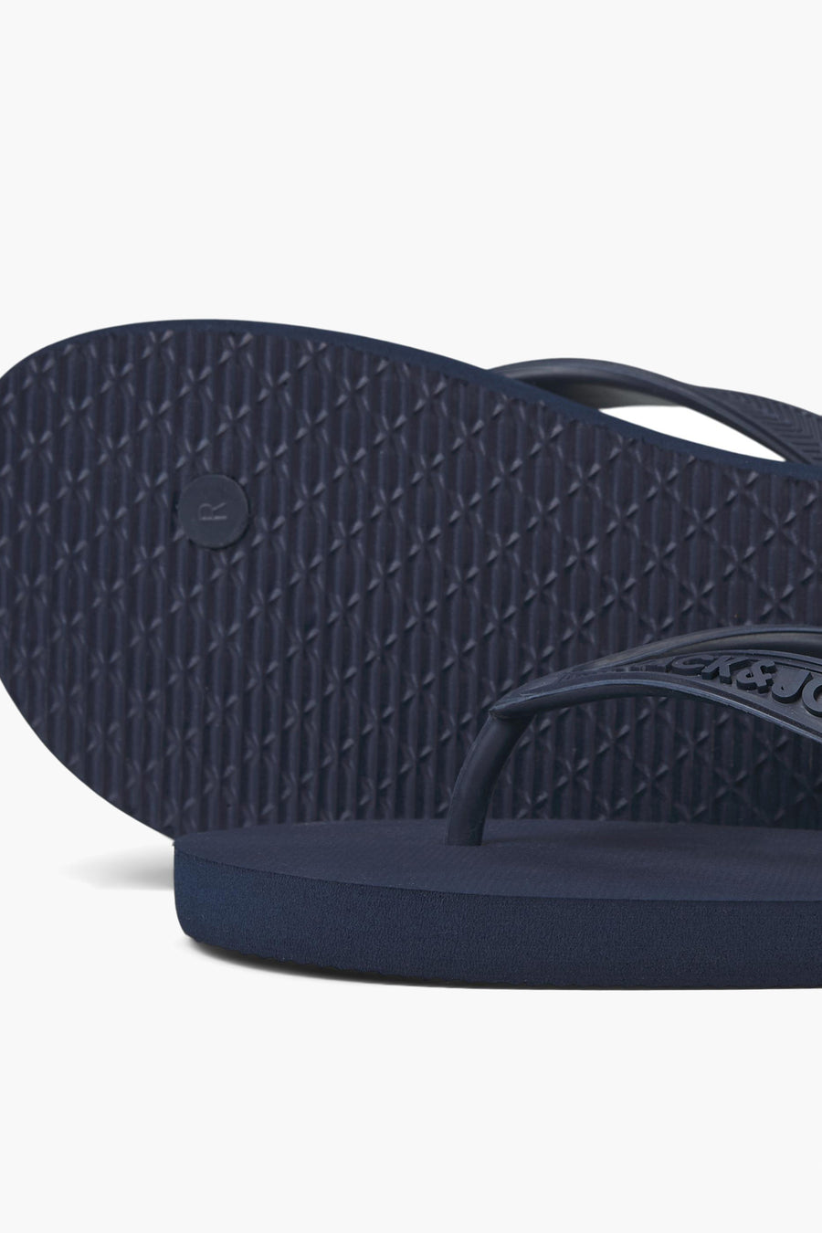 Blauwe slippers van ACCESSORIES BY JACK & JONES, met een textuurpatroon op de zool.