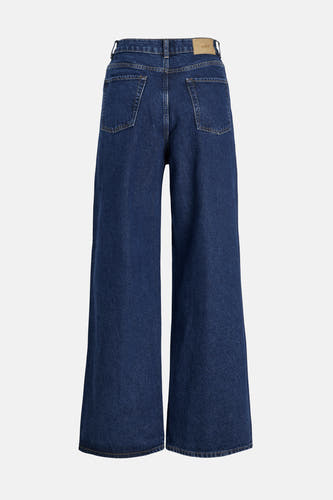 Donkerblauwe wijde jeans van JJXX, achterkant met zakken en merklabel in de tailleband.
