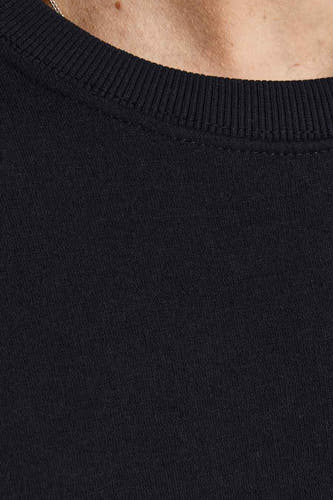 Zwarte sweater van CORE BY JACK & JONES, met ronde hals en een ribgebreide kraag.