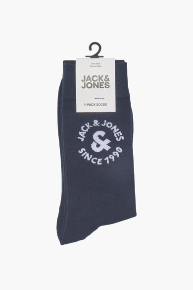 Chaussettes bleues d'ACCESSORIES BY JACK & JONES avec logo blanc et impression 'since 1990'.